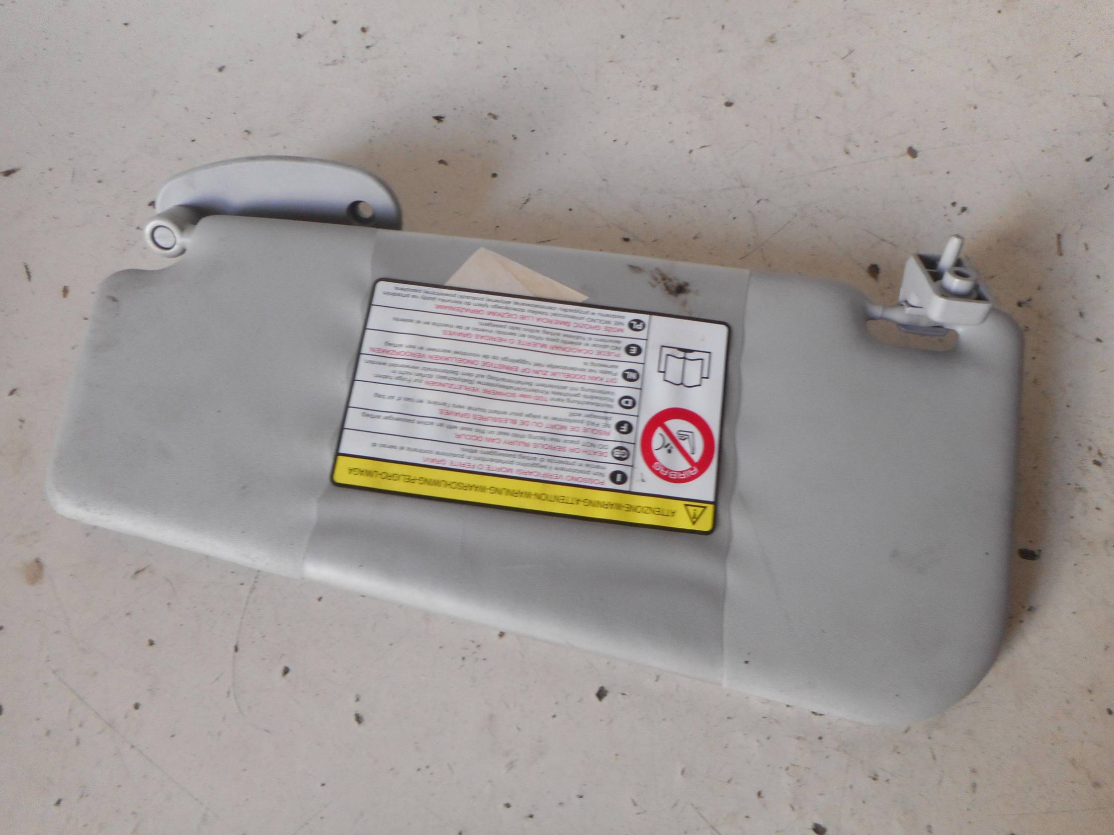 Aletta parasole parabrezza dx.